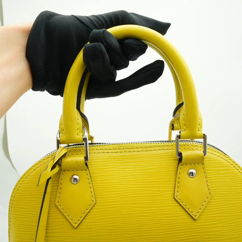 Authentic Louis Vuitton EPI Alma BB Yellow - Picture 12 of 16